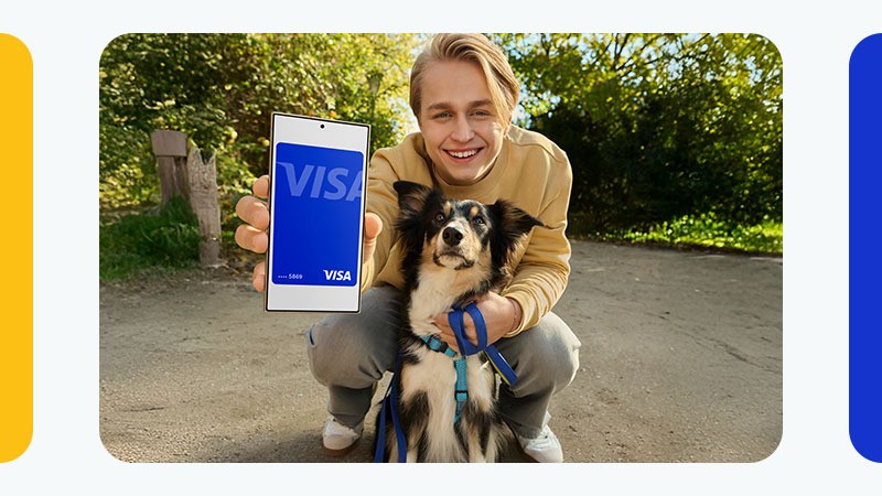 Man with phone and dog