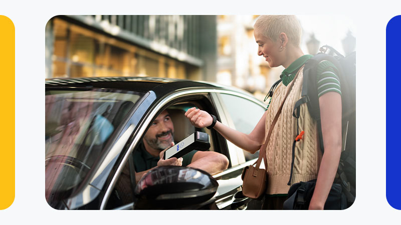 woman paying taxi with smart watch