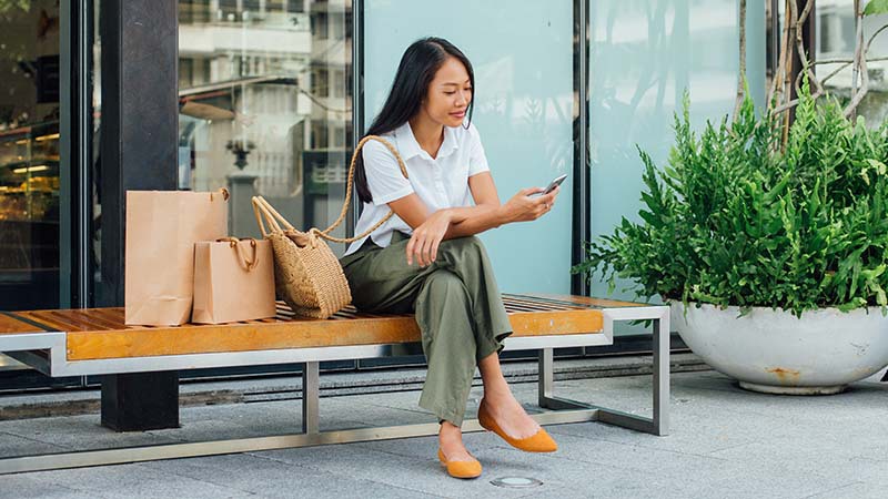 woman sitting on bench